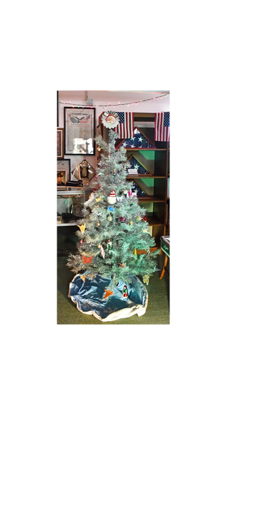 We recently set up a Christmas tree. If you have an old ornament you'd like to donate please bring i