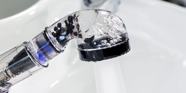 tap of running water into sink