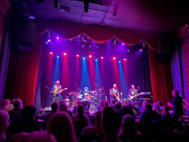 the Paul Waltz Band playing live on stage