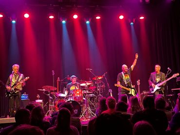 The Paul Waltz Band playing live on stage