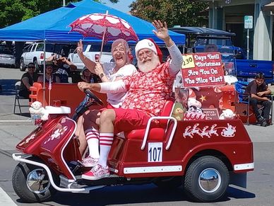 Santa and Mrs. Claus in the Dixon May Fair parade