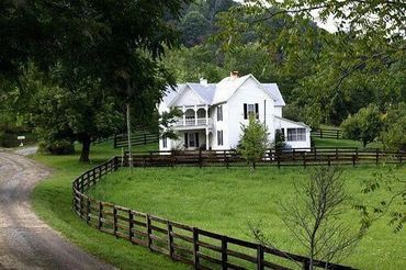 A white house near trees