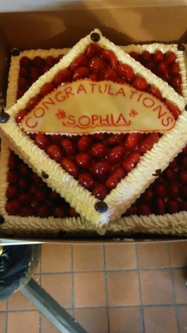 Montmarte------Layers of sponge cake, fresh yogurt, whipped cream and glazed strawberries