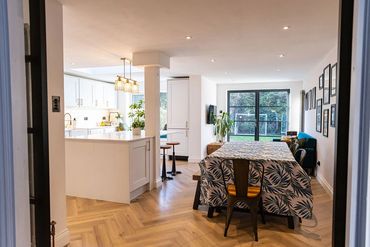 View from the original house into the new kitchen, dining and family room.