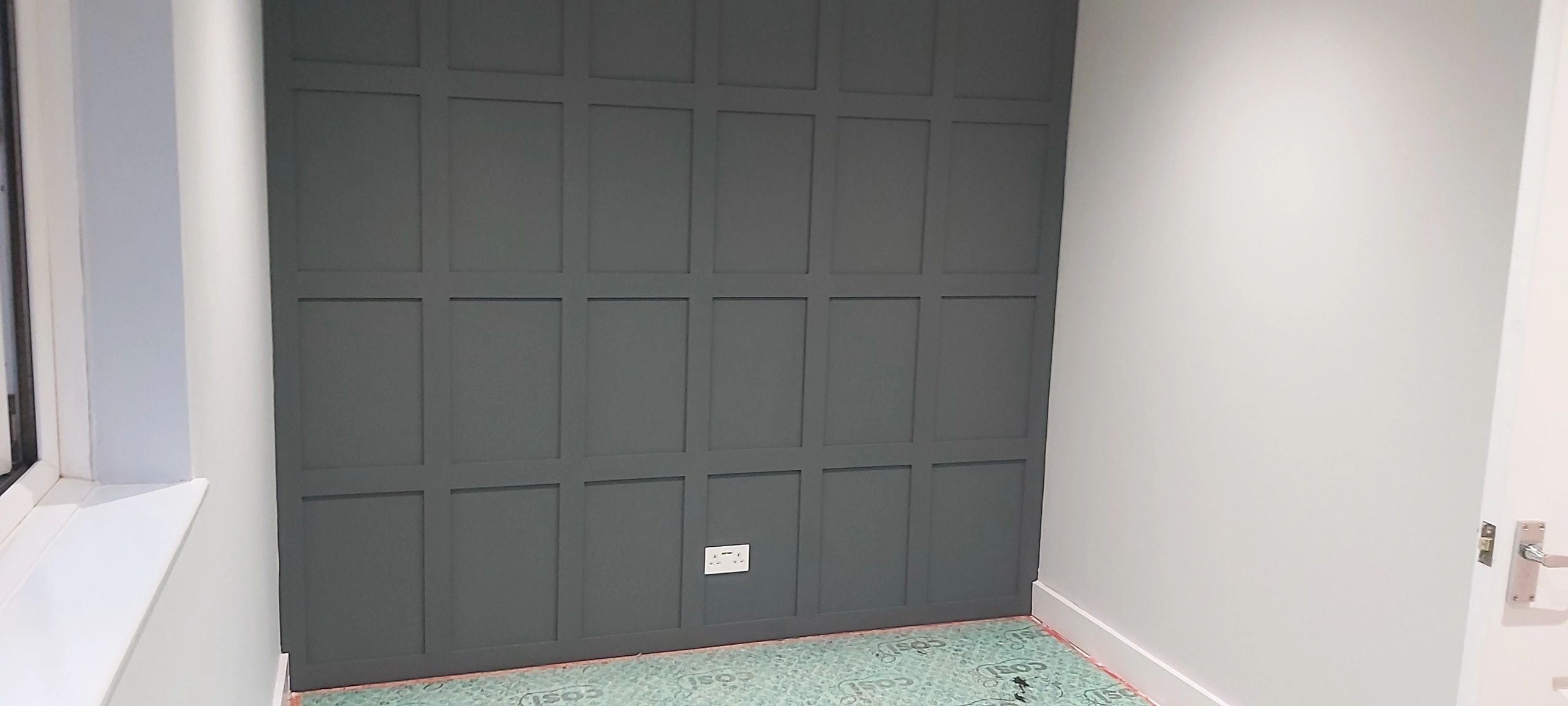 Handmade MDF paneling to create a feature wall in bedroom.