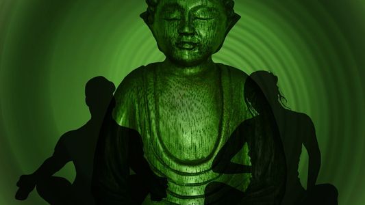 Statue with practitioners in the foreground