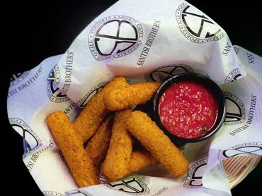 SANTISI BROTHERS basket of mozzarella sticks served with house-made tomato sauce