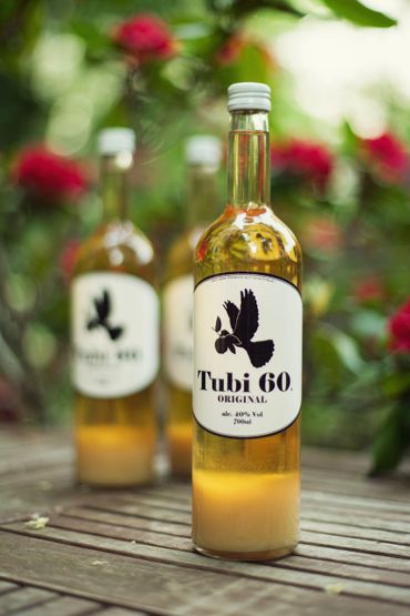 Tubi 60 bottles on a table outside