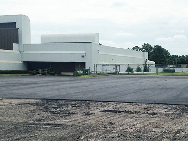 A new paved surface course of asphalt for an industrial customer.