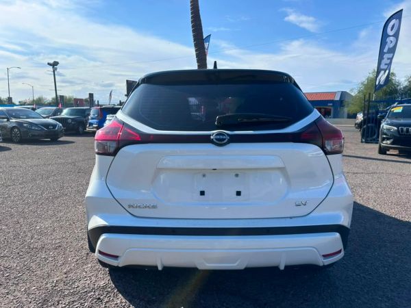 Rear view of a white Nissan Kicks SUV.