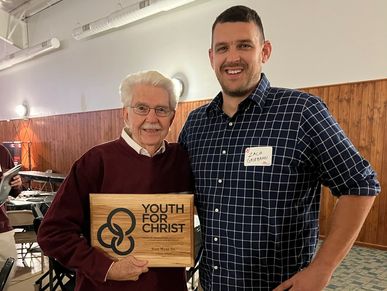 Man received a Hickory hardwood Plaque for Youth for Christ event. Plaques made by Clayton Meadow.
