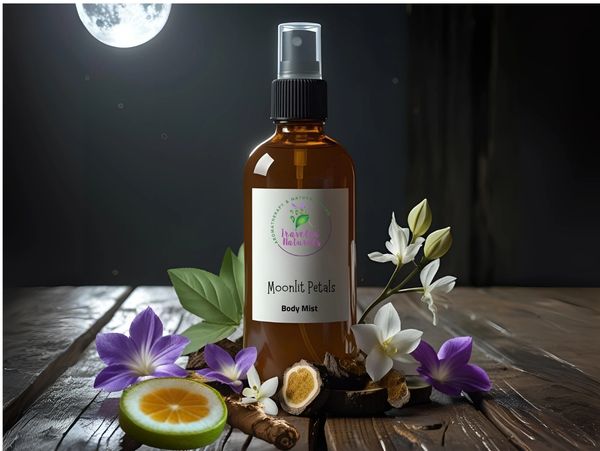 Moonlit Petals body mist bottle surrounded by flowers and fruits under moonlight.