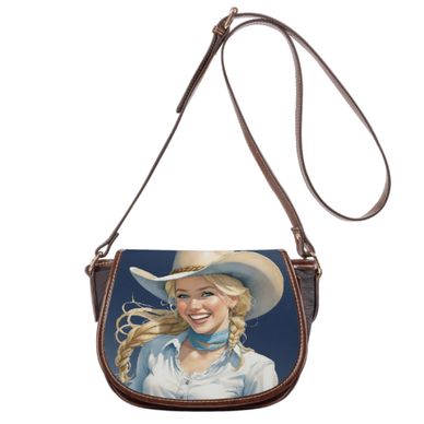 Spring 2024 pretty blond cowgirl in oversized cowboy hat, laughing and happy on crossbody bag. Purse.