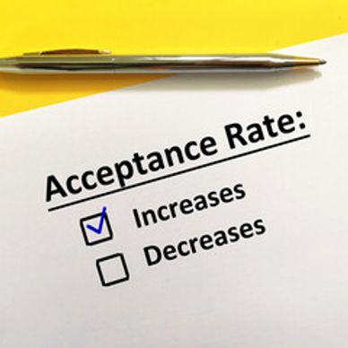 Image of a paper with a pen that says Acceptance Rate with the increase box checked.