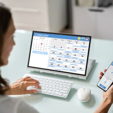 Image of a woman scheduling an online appointment