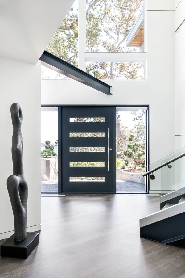 interior design new custom pivot door in modern home renovation 
