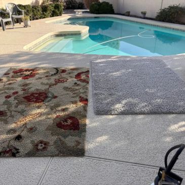 Two rugs on a poolside patio with a swimming pool in the background.