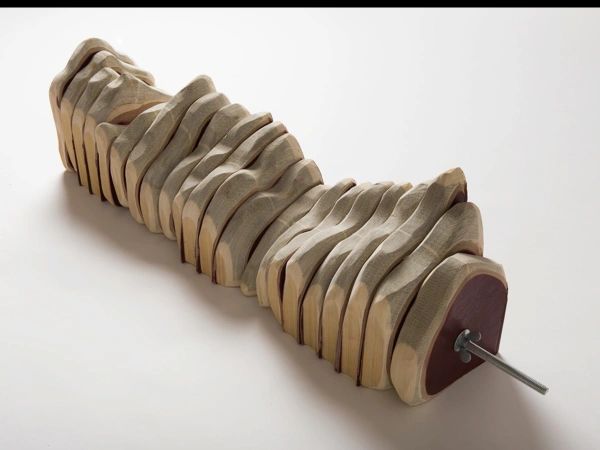 Carved set encyclopedia with steel rod and wingnuts, finalist, Advertiser Contemporary Art Award.