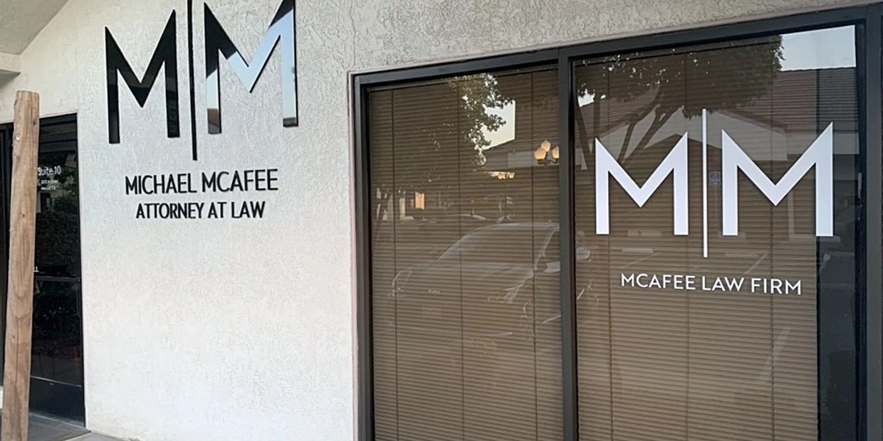 Exterior of McAfee Law Firm office with signage.