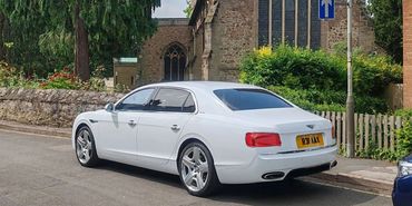 LEICESTER PLATINUM CHAUFFEURS BENTLEY FLYING SPUR AT AYLESTONE CHURCH CIVIL WEDDING