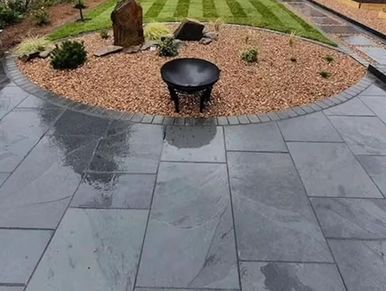 Image shows new natural stone patio in old Toronto