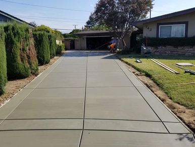 Image shows new concrete driveway installed by our team in Toronto