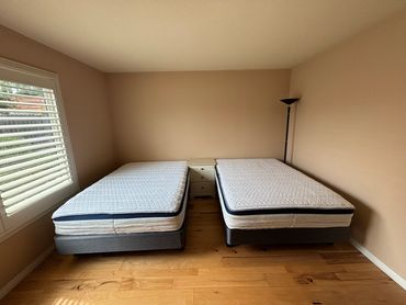 Furniture assembly of two beds. This is the after photo. see previous image for the before look.