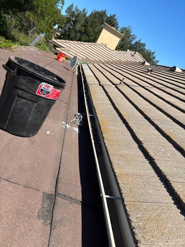 Roof Cleaning, leaf removal, and gutter cleaning. Example from the previous image of the finished wo