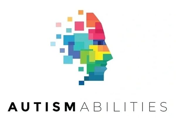 Colorful pixelated human profile with 'Autism Abilities' text below.
