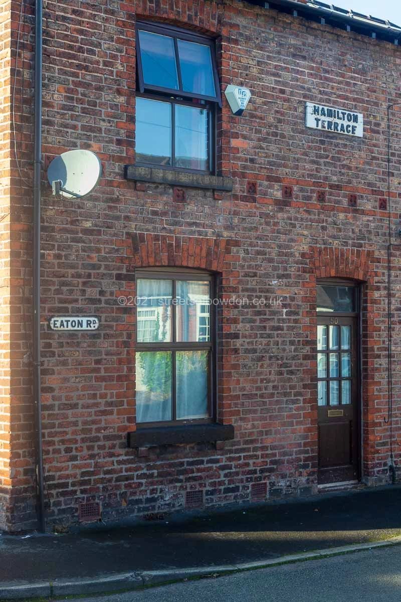 Small terraced house with satellite dish