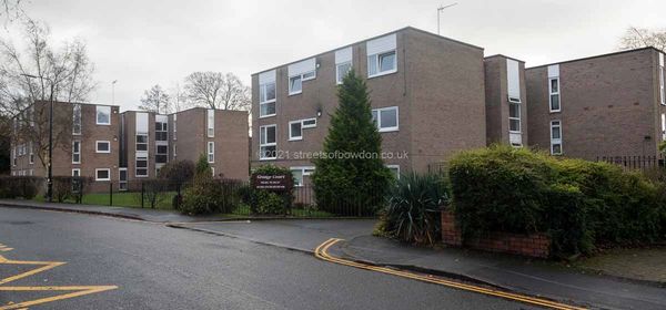 Block of post-war flats facing onto road