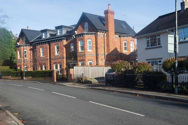 Large, red-bricked semi-detached properties