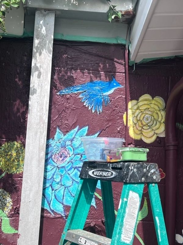 Blue Bird and Flowers in Coastal Custom Mural at Grape and Ale in Oak Island, NC