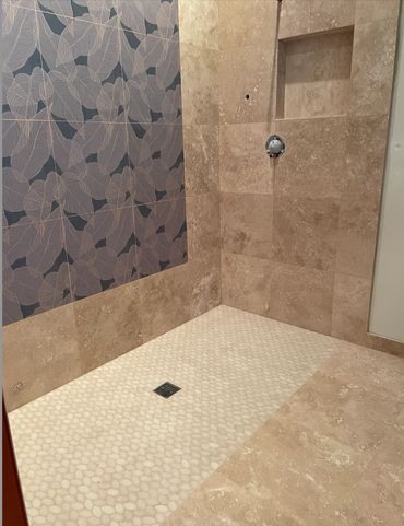 Rainforest painted mural with travertine walls, limestone floor