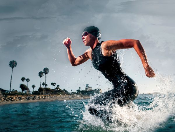 Woman running in water.