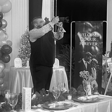 Jace Banksy photographing at a wedding rehearsal.