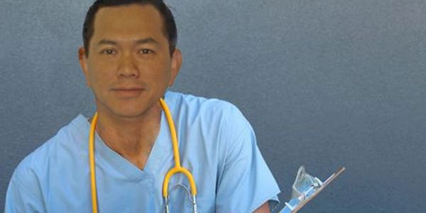 Dr. Doan Nguyen wearing a stethoscope
