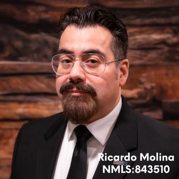 Professional man in suit with glasses.