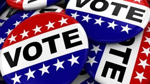 Red, white, and blue 'VOTE' buttons with stars.