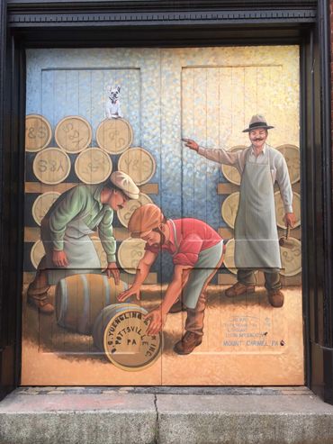 Right Mural Yuengling brewery, Pottsville, PA. Beer barrels, laborers, french bulldog