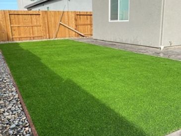 Landscape turf on the side of a house