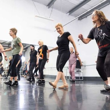 Group tap dancing class in session.