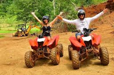 “Family enjoying an adventure tour in Jacó Costa Rica, part of a family vacation package.”