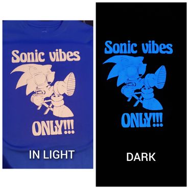 Sonic-themed shirt glows blue in the dark with text 'Sonic vibes ONLY!!!'.