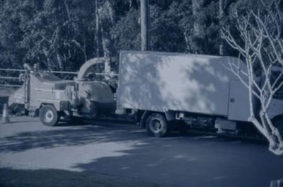 Truck and woodchipper.