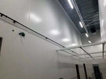 Cammercial gas line installed on large wall