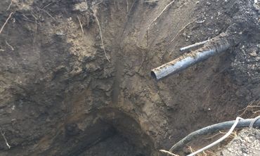 Sewer Line Pipe Exposed