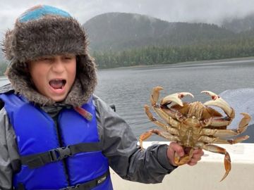 Kids love crabbing with reel alaska fishing charters