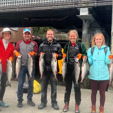Charter clients happy after a half day salmon fishing with Reel Alaska Fishing Charters