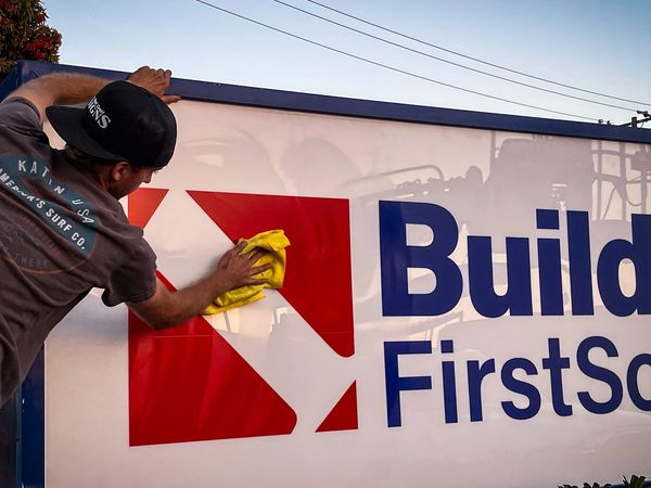 Sign with plastic insert. Builders FirstSource sign. logo design, red sign, sign company in Ventura.